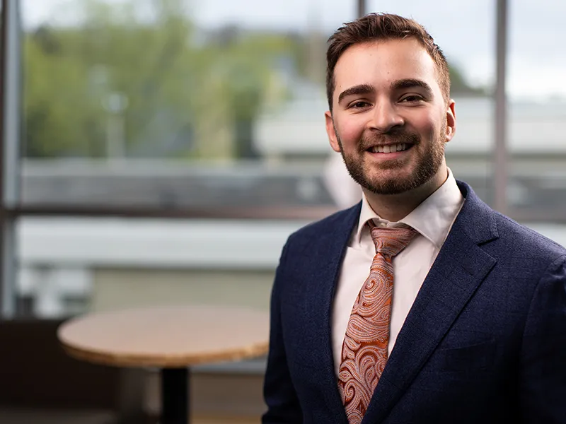 business student in a suit